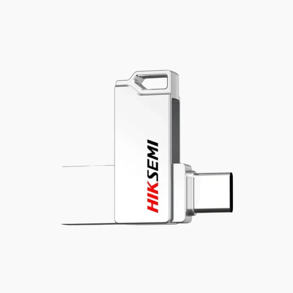 The Hiksemi Sync E327C USB 3.2 Flash Drive in Silver is a versatile, high-performance storage solution designed for users who demand speed, portability, and reliability. With USB 3.2 high-speed connectivity, this flash drive delivers up to 150 MB/s read and 45 MB/s write speeds, allowing you to quickly transfer large files, documents, photos, and videos with ease. Its dual-interface design (USB-A and USB-C) makes it fully compatible with a wide range of devices, including PCs, laptops, and OTG-enabled smartphones or tablets. This flexibility ensures seamless file sharing and easy access across platforms without the need for adapters. The drive’s compact metal casing in silver not only looks premium but also protects the internal components from daily wear and tear, making it perfect for carrying in your pocket, bag, or laptop case. Available in 64GB, 128GB, and 256GB capacities, you can choose the right size for your storage needs, whether for casual file transfer, media storage, or backup purposes. Designed for broad compatibility with Windows, macOS, and Linux, the Hiksemi Sync E327C supports OTG connections for mobile devices, making it an ideal companion for professionals, students, and tech enthusiasts. The flash drive is durable, reliable, and backed by a 5-year warranty, providing peace of mind while handling important data. Whether transferring files between devices, backing up critical documents, or carrying media on the go, the Hiksemi Sync E327C USB 3.2 Flash Drive offers a perfect blend of speed, portability, and durability — all in a sleek silver design that complements your tech setup. The Hiksemi Sync E327C USB 3.2 Flash Drive in Silver is a versatile, high-performance storage solution designed for users who demand speed, portability, and reliability. With USB 3.2 high-speed connectivity, this flash drive delivers up to 150 MB/s read and 45 MB/s write speeds, allowing you to quickly transfer large files, documents, photos, and videos with ease. Its dual-interface design (USB-A and USB-C) makes it fully compatible with a wide range of devices, including PCs, laptops, and OTG-enabled smartphones or tablets. This flexibility ensures seamless file sharing and easy access across platforms without the need for adapters. The drive’s compact metal casing in silver not only looks premium but also protects the internal components from daily wear and tear, making it perfect for carrying in your pocket, bag, or laptop case. Available in 64GB, 128GB, and 256GB capacities, you can choose the right size for your storage needs, whether for casual file transfer, media storage, or backup purposes. Designed for broad compatibility with Windows, macOS, and Linux, the Hiksemi Sync E327C supports OTG connections for mobile devices, making it an ideal companion for professionals, students, and tech enthusiasts. The flash drive is durable, reliable, and backed by a 5-year warranty, providing peace of mind while handling important data. Whether transferring files between devices, backing up critical documents, or carrying media on the go, the Hiksemi Sync E327C USB 3.2 Flash Drive offers a perfect blend of speed, portability, and durability — all in a sleek silver design that complements your tech setup.